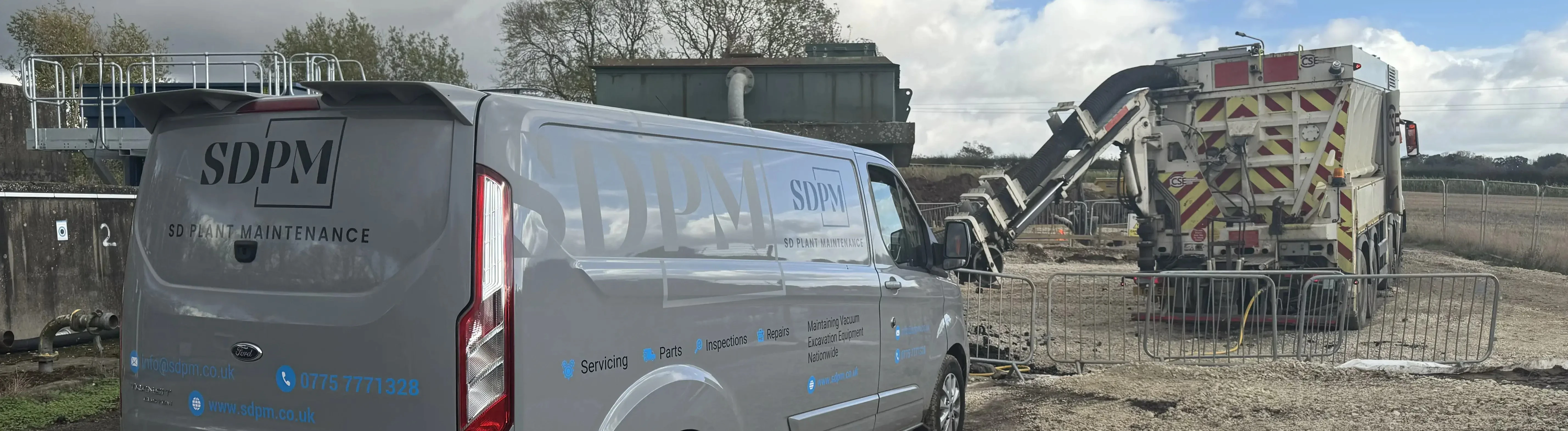 Mobile repair van traveling to customer site for on-site excavator maintenance service